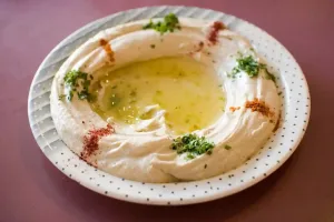 Creamy Hummus Dip with Fresh Tomatoes and Basil