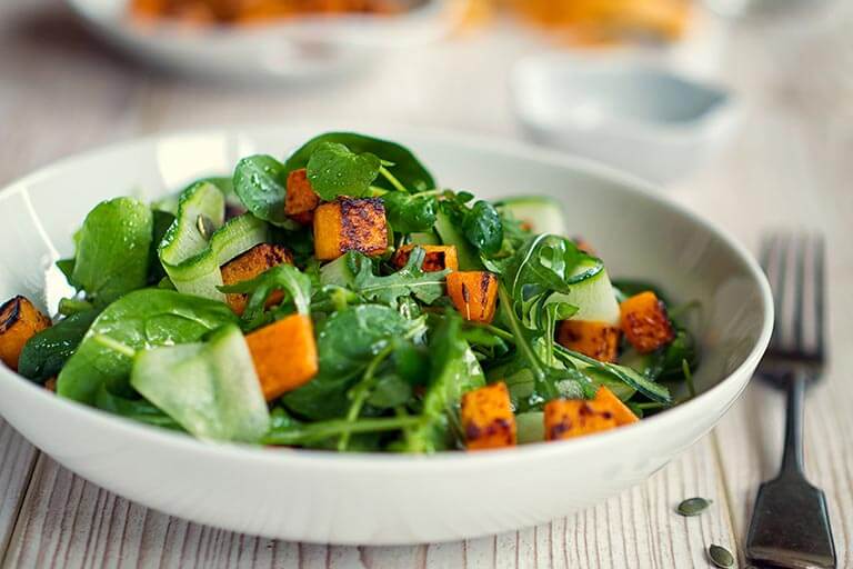 Roasted Butternut Squash Salad on a Bed of Baby Spinach