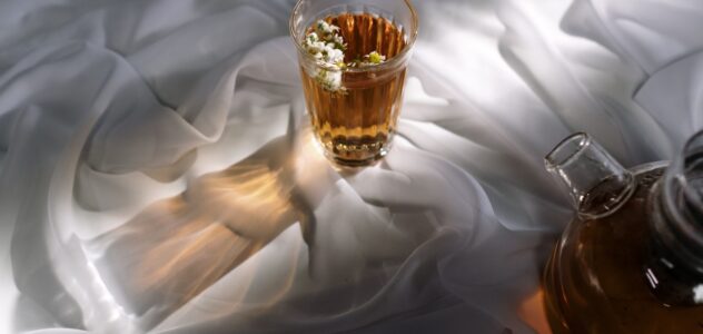 cup of tea on white sheets
