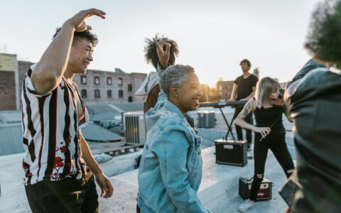 group of people dancing outside