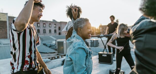 group of people dancing outside