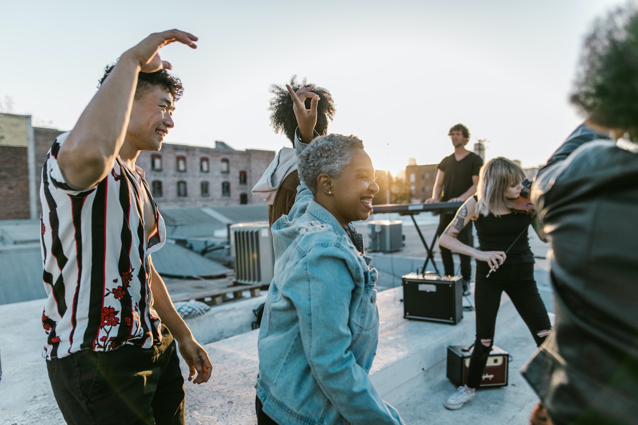 group of people dancing outside