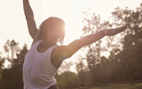 man stretching outsie