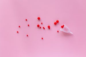 Red beads with white plastic cup