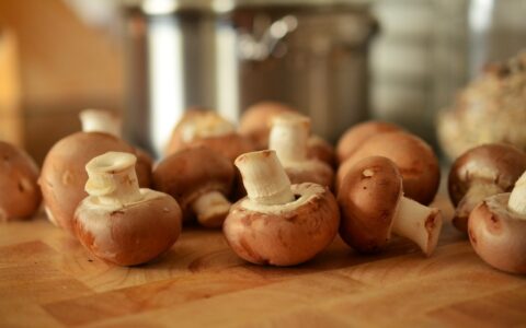 mushrooms on a wooden cutting board