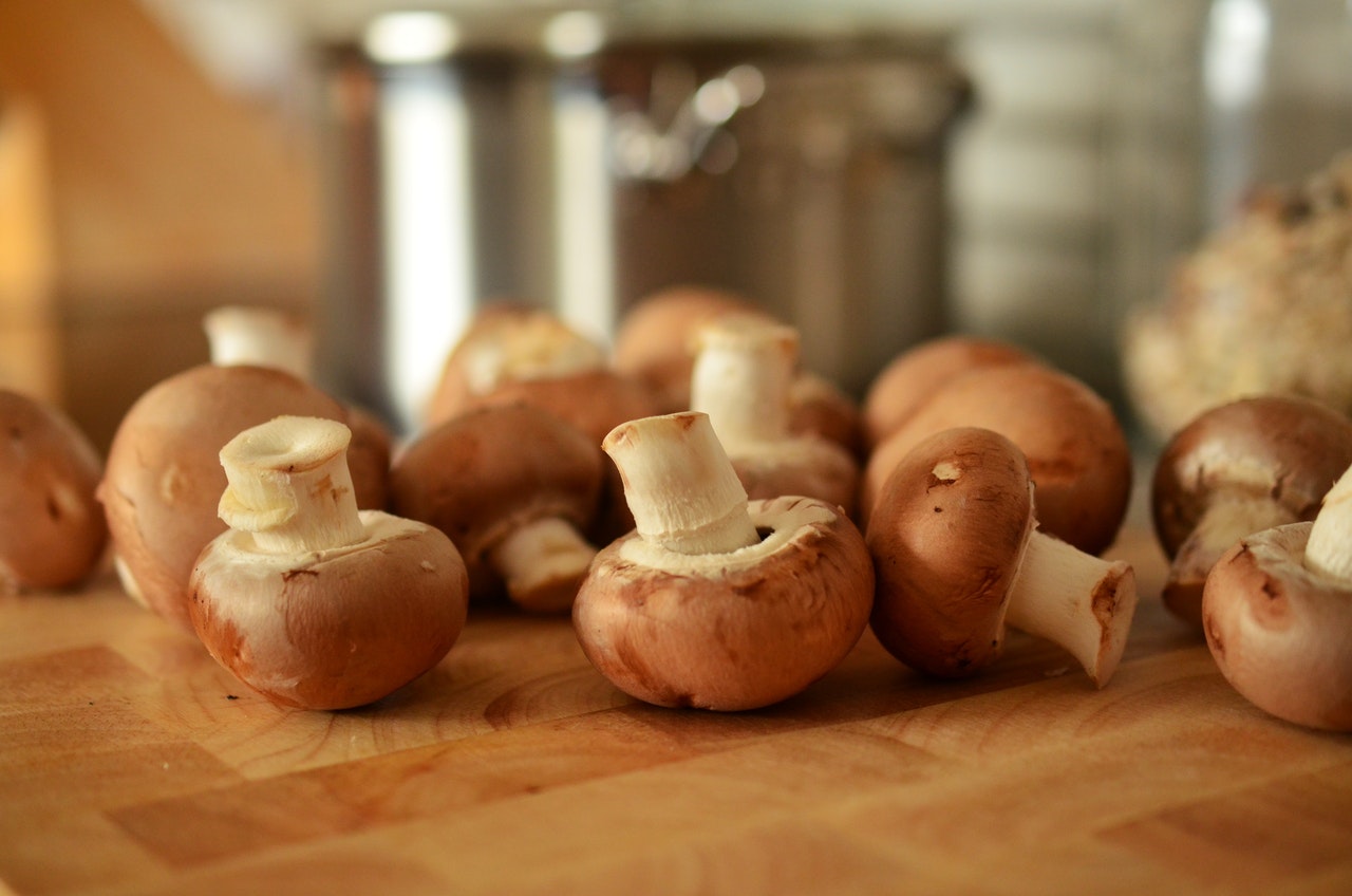 mushrooms on a wooden cutting board