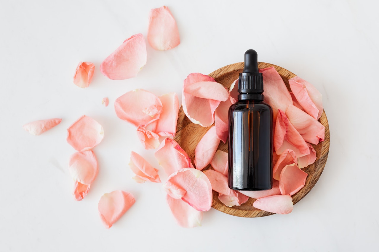 dark tincture on rose petals