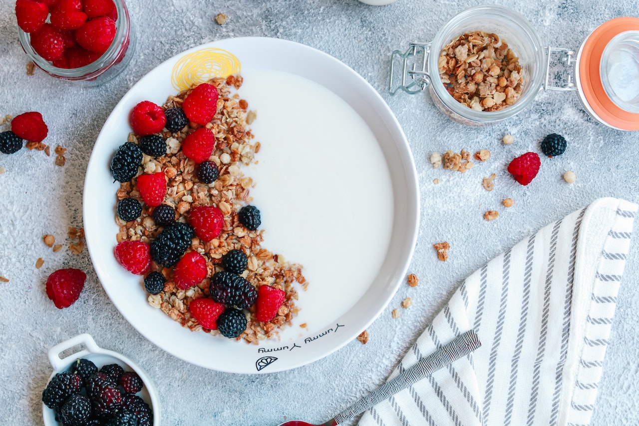 bowl of yogurt with berries and granola