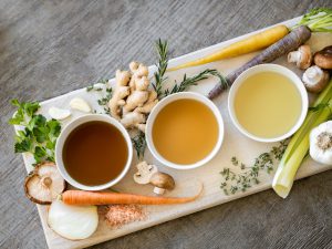 tea on board with ginger and herbs