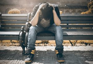 Guy sitting on bench