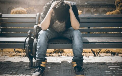 Guy sitting on bench