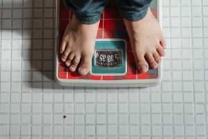 someone standing on a scale