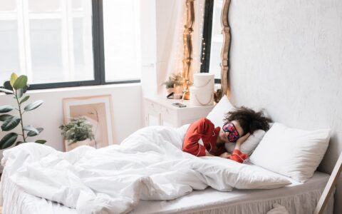 woman sleeping in bed