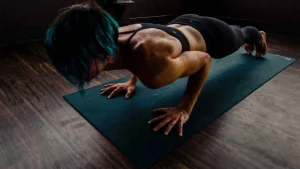 woman stretching on a mat
