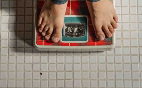 someone standing on a scale