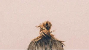 top of a woman's ponytail