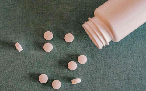 white pills and bottle