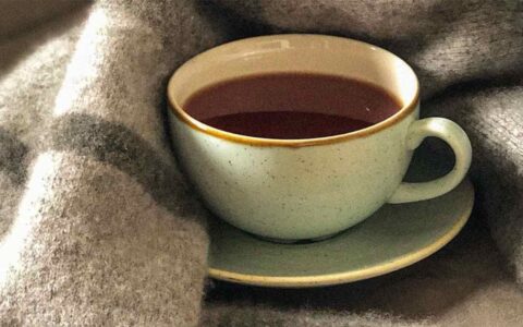 mug wrapped in a blanket