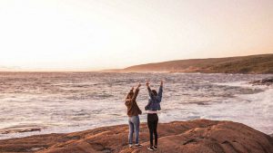 two friends at the beach