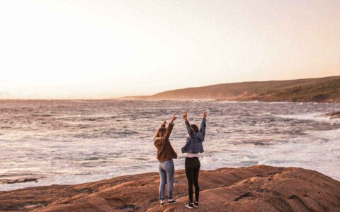 two friends at the beach