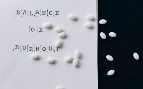 Stress management tips written on a clear white paper representing strategies for natural stress relief and burnout prevention