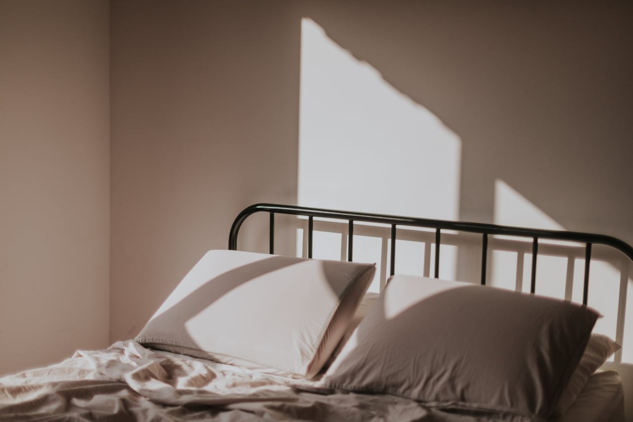 Morning sunlight in a bedroom supporting better sleep after 40 and circadian rhythm balance