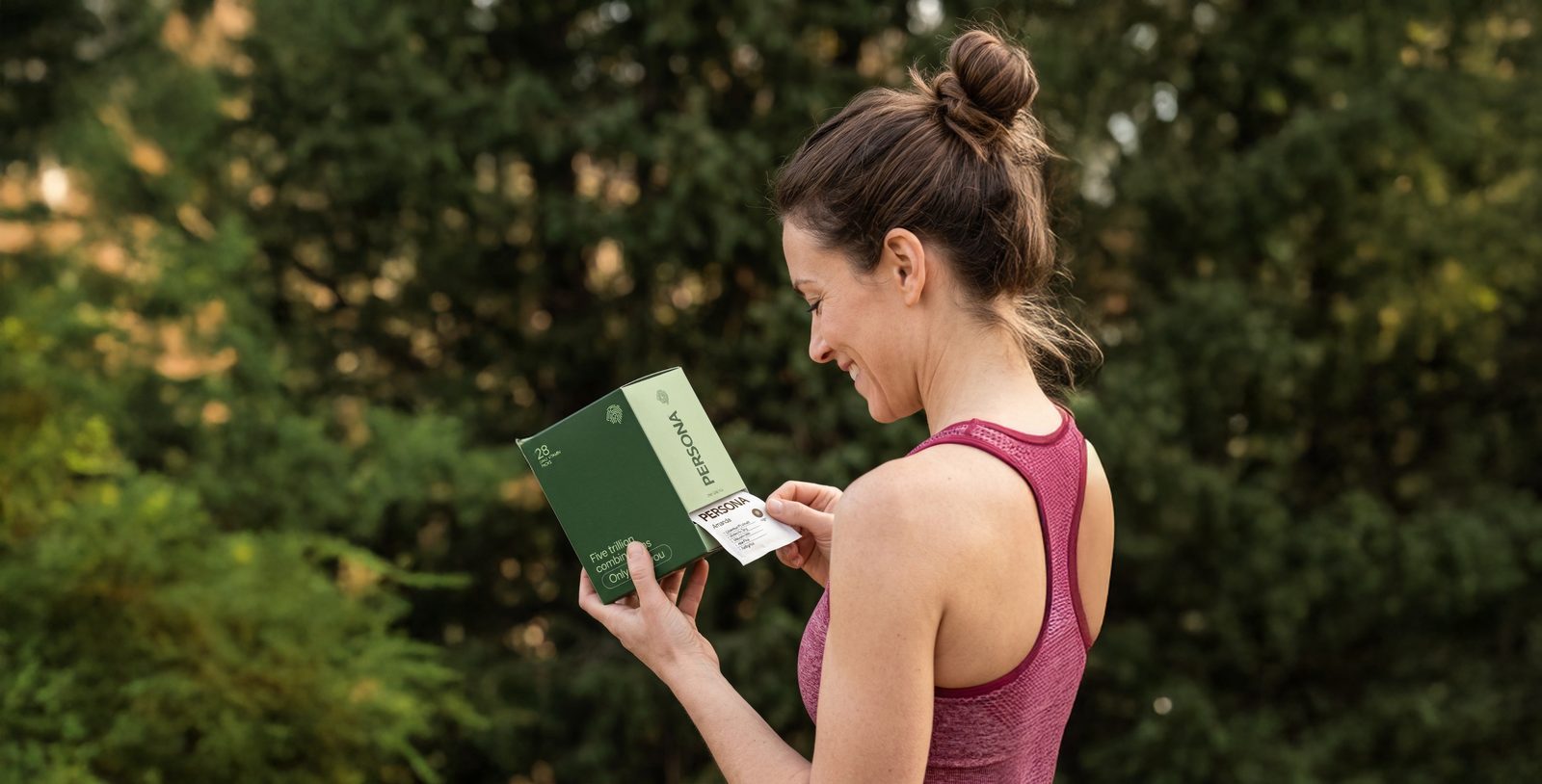 Woman reviewing her personalized supplement results on her phone